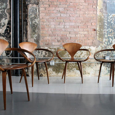 Set of 4 'Cherner' chairs in walnut by Norman Cherner (circa 2007)