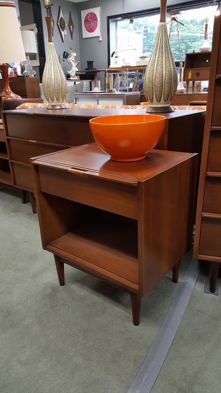 Mid-Century Modern American walnut nightstand with rattan-wrapped pull