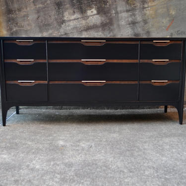 Mid Century modern nine drawer dresser with black laquer and walnut trim 