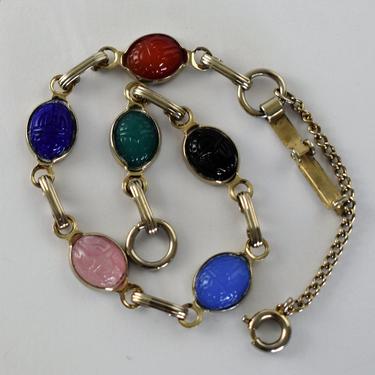 50's Egyptian revival glass scarabs gold plated metal bracelet, colorful mid-century carved beetles links w/ safety chain bracelet 
