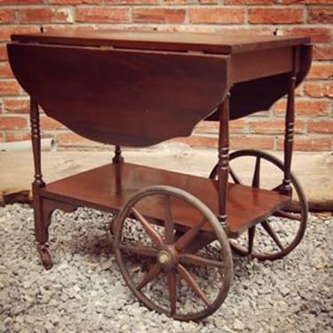 It's Friday, you made it!! Serve some #drinks tonight from this #vintage wooden #barcart with drop leaves. Tuck it next to your couch as an #endtable when you aren't #entertaining!