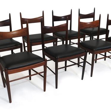 Eight Brazilian Rosewood Dining Chairs in New Black Leather