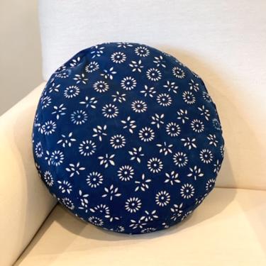 our signature round blue floral pillows
