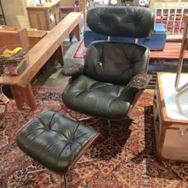 Eames style black leather chair and ottoman