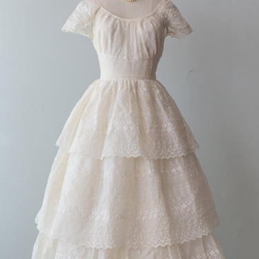 Vintage 1950s Wedding Dress - 50s Ivory Cotton Eyelet Tiered Wedding Gown With Cap Sleeves And Full Skirt  // Waist 24 by xtabayvintage