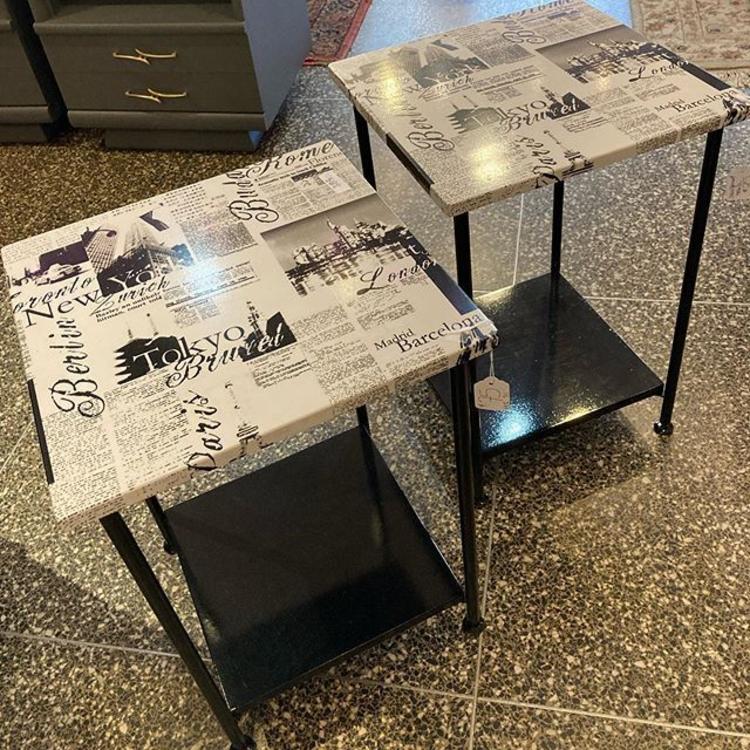 Newsprint laminate tables, 14.5” square, 21.25” high. 