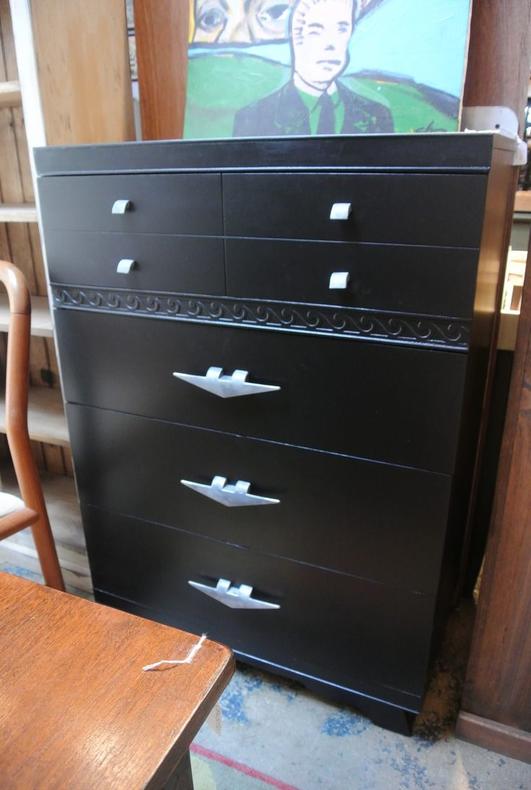 Art deco machine age black chest of drawers