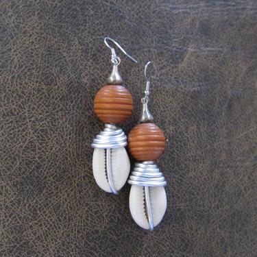 Bold cowrie shell earrings, unique modern dangle earrings, Afrocentric African earrings, statement bold earrings, wire wrapped silver orange 