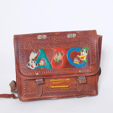 Vintage 40s leather schoolbag / 1940s Looney Tunes book bag / tooled leather bag / cartoon memorabilia / teacher bag / children's backpack 