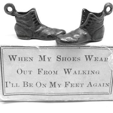 Antique Metal Shoes in Cardboard Box,  Verse:  When my Shoes Wear Out from Walking, I'll Be on My Feet Again 