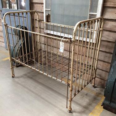 Antique baby crib, cast iron and brass. $395. #vintage