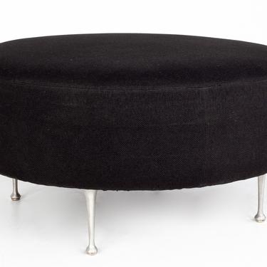 Upholstered Black Ottoman with Chrome Legs 
