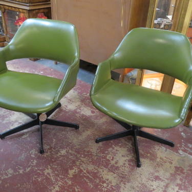 Vintage MCM pair of Arthur Umanoff swivel chairs