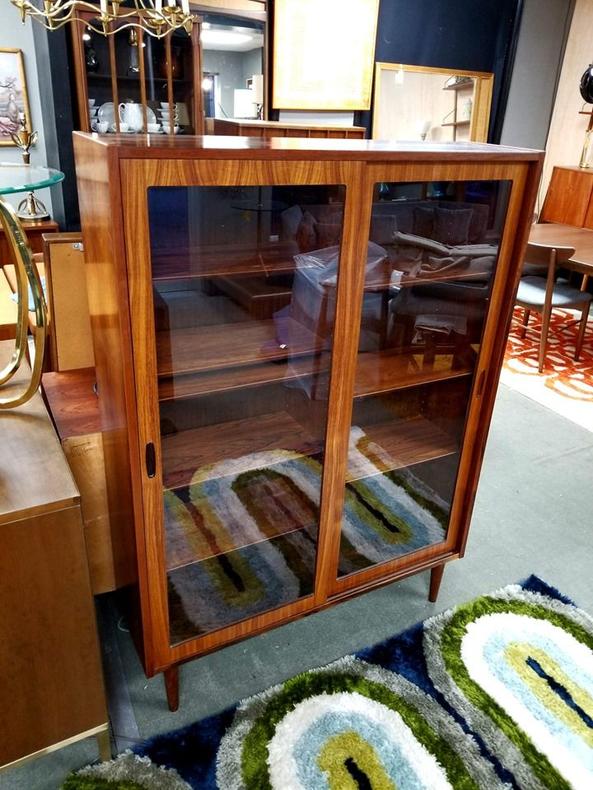                   Danish Modern rosewood display cabinet with sliding doors by Poul Hundevad