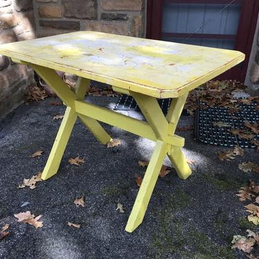 yellow painted wooden table