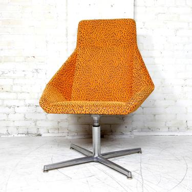 Atomic star-trek style orange swivel armchair with tall back by Arcadia Chairs in CA NIOS@ | Free delivery in NYC and Hudson Valley areas 