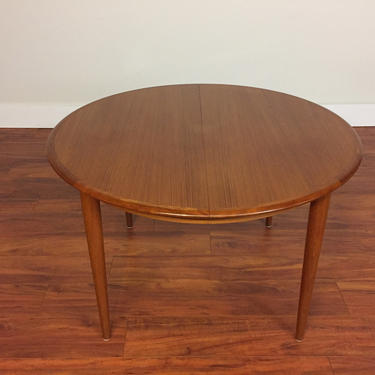 Skovmand and Andersen Expandable Round Teak Dining Table With Three Leaves - Made in Denmark 