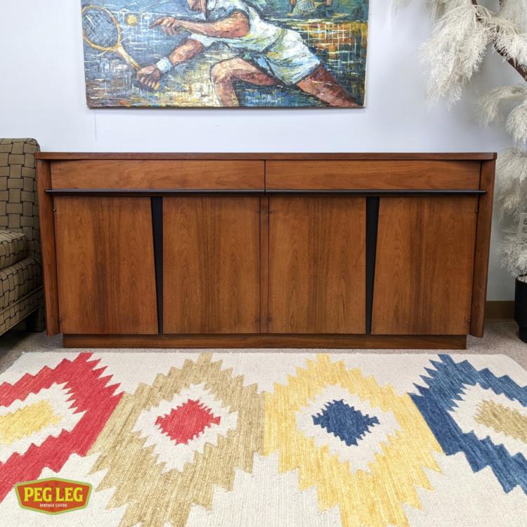 Mid-Century Modern walnut credenza with black details by American of Martinsville