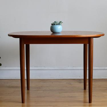 Mid Century Danish Modern Round Teak Table with Butterfly Leaf 