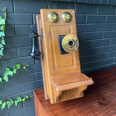 Old Timey Wall Phone with Rotary Dial Inside Candlestick Receiver Vintage Early Century Land Line Telephone 