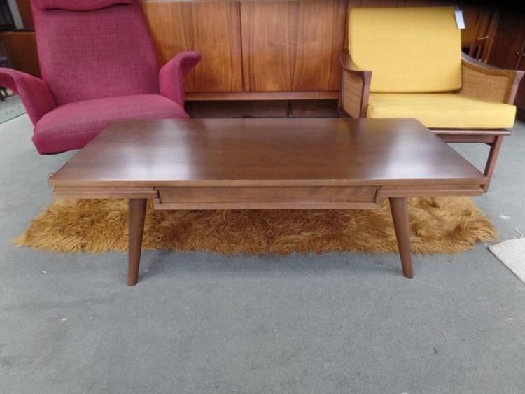 Mid-Century Modern coffee table with pass through drawer