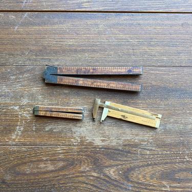 Pair of Antique Wood Folding Rulers and Stanley No. 136 Caliper 