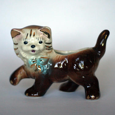 vintage kitty planter with blue bow 