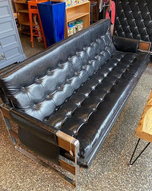 Black vinyl midcentury sofa, 75”L x 28”W x 21”T 