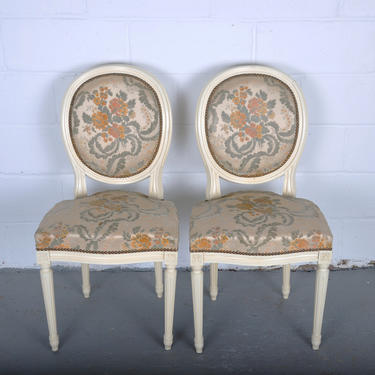 Pair of 1960’s Louis XVI French Medallion Oak Dining Chairs W/ Carved Antique White Frame and White Embroidered Velvet Upholstery 