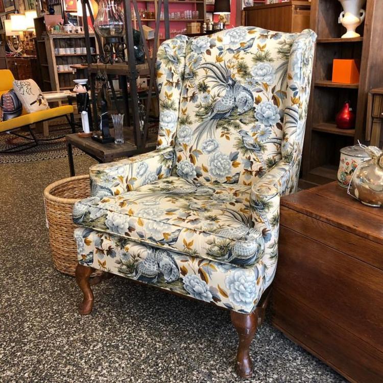                   Upholstered wingback chair