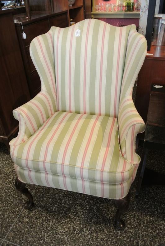 Striped upholstered wingback chair. $225. Two available