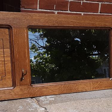 Upcycled oak hat hook mirror with carved panels 
