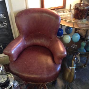 SOLD - Pair of Mid Century Round back leather chairs with nail head trim.