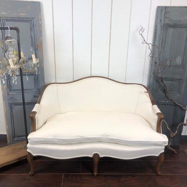 Antique PAIR of matching settees/loveseats, reupholstered in white linen/cotton blend 