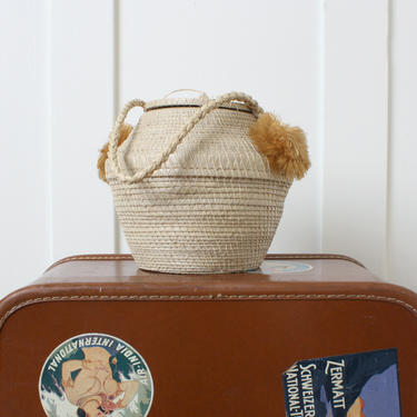 handmade vintage straw raffia basket purse • roomy round pom pom lidded basket bag 