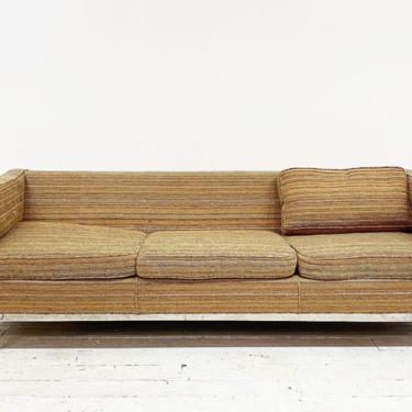Chrome base sofa
