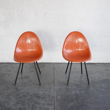 Orange Fiberglass Shell Chairs