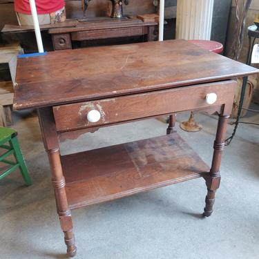 Fun little table on casters with a drawer 32"×22"×30 1/2"