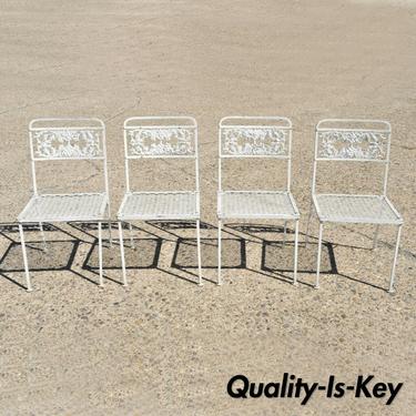 Set of Four Vintage Wrought Iron Patio Garden Dining Chairs with Flower Backs