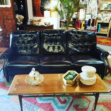 Faux leather chesterfield sofa $500