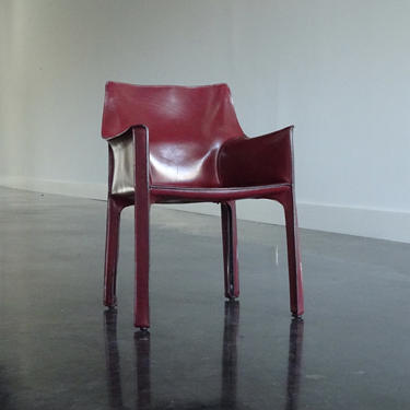 Oxblood leather CAB chair by Bellini produced by Cassina 