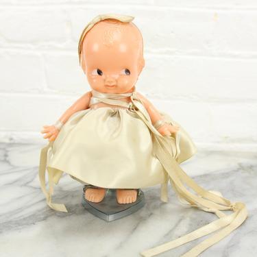 Irwin Kewpie Style Celluloid Baby Doll with Dress and Bow on Base, 6&amp;quot; 