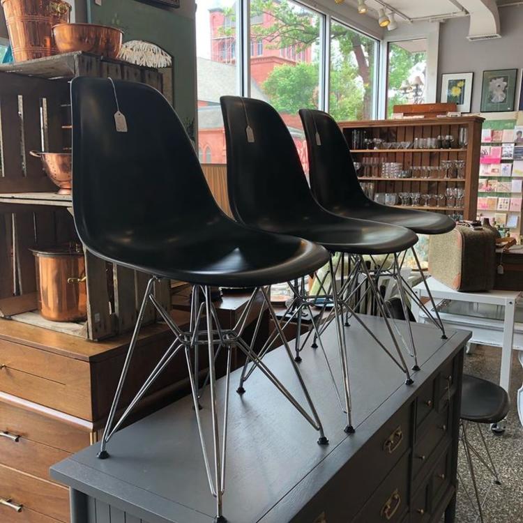                   Black eames style shell chairs! 4 available at $65 each