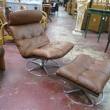 Danish modern leather lounge chair and ottoman