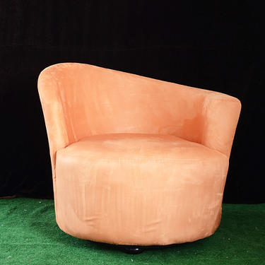 pair of salmon pink Art Deco style swivel armchairs 