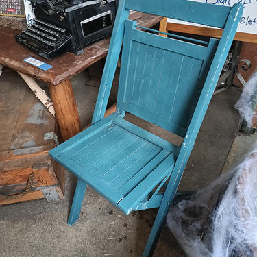 Blue wood folding chair