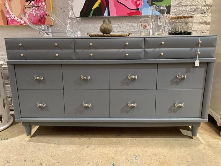 Amazing storage, stunning details on this gray painted mid century dresser. 58” x19” x32” 