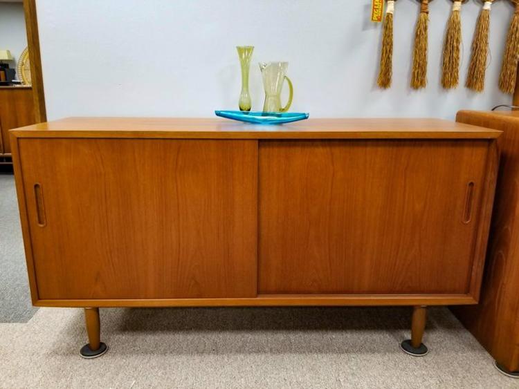                   Danish Modern teak credenza with pull out record shelf
