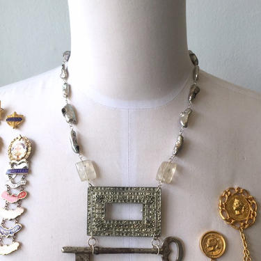 Key To a Kingdom [assemblage necklace: vintage rhinestone brooch, skeleton key, quartz, baroque pearls] 