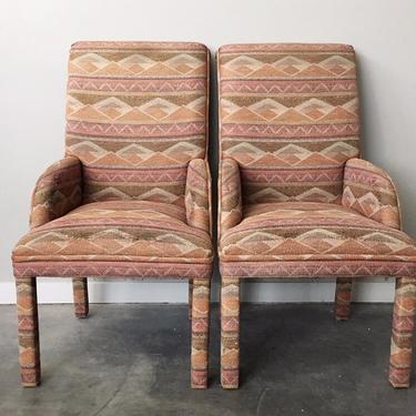 pair of vintage parsons chairs with low arms.